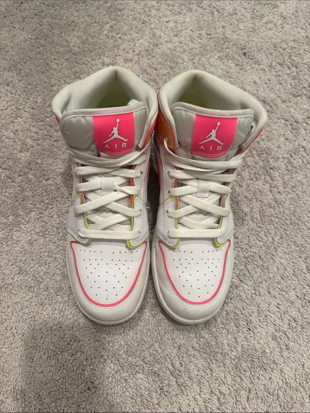 Kids Jordan White High-Top Sneakers with Neon Pink and Orange Accents